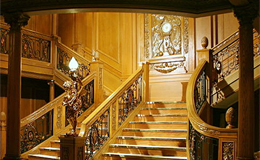 Model of one of Titanic’s two grand staircases showing the carving Honour and Glory Crowning Time