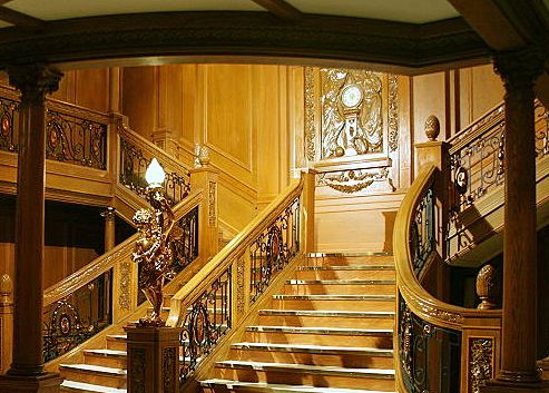 A model of one of Titanic’s two grand staircases showing the carving Honour and Glory Crowning Time