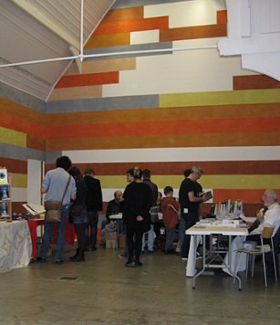 Visitors to the Birmingham Independent Book Fair, at the Ikon Gallery. Showing David Tremlett's 3 Drawing Rooms.